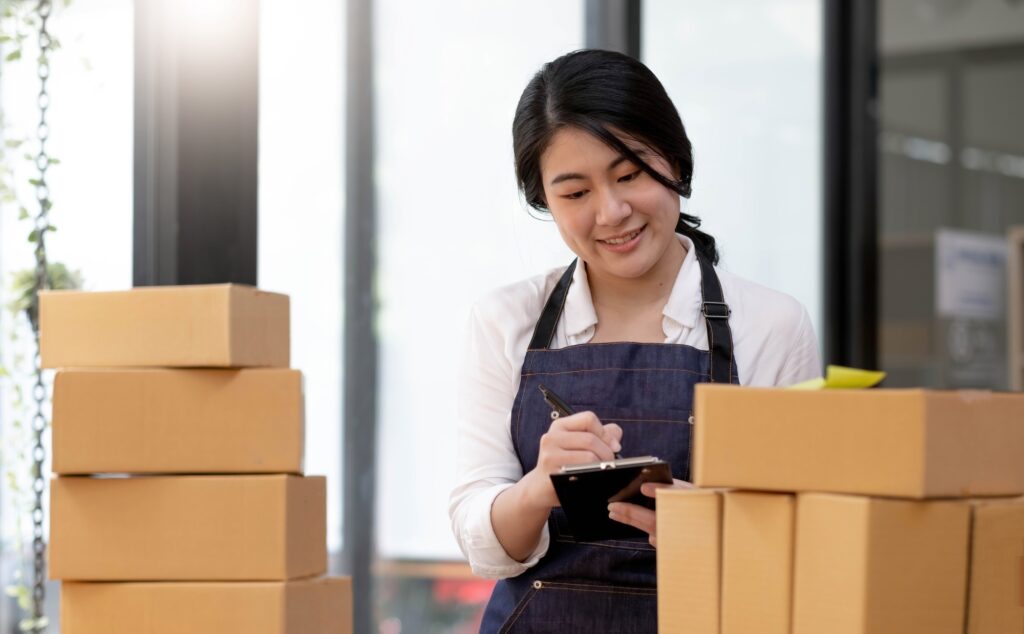 Portrait, entrepreneur, young Asian woman, freelance business, sme business, online shopping