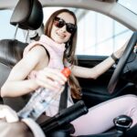 Sports woman driving a car