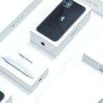 Flat lay of assorted Apple product boxes showcasing technology packaging design.