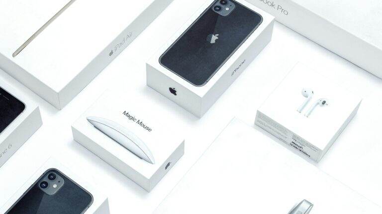 Flat lay of assorted Apple product boxes showcasing technology packaging design.