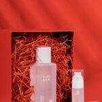 Elegant skincare serum bottles on a vibrant red background. Perfect for beauty and cosmetics promotions.