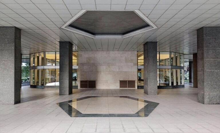 Contemporary lobby entrance with glass and columns in Buenos Aires, Argentina.