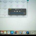 Close-up view of a music player interface displayed on a laptop screen.