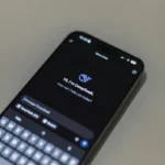 Close-up of smartphone screen showing AI chatbot interface, featuring DeepSeek AI conversation.