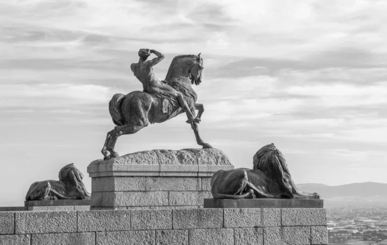 Black and white image of a rider statue at Rhodes Memorial, Cape Town.