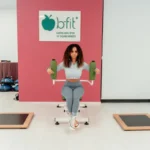 A woman exercising at B-Fit gym in Yalova, Türkiye, focused on fitness and health.