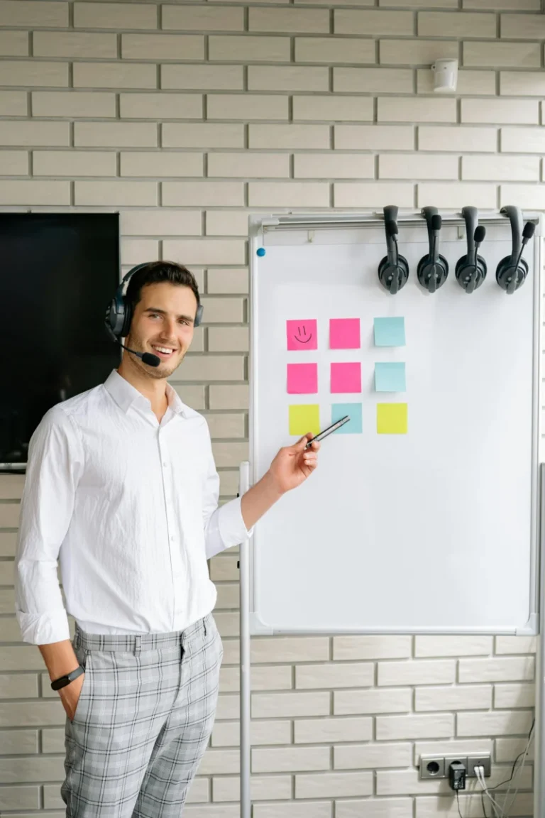 Professional man presenting with a headset in an office setting.