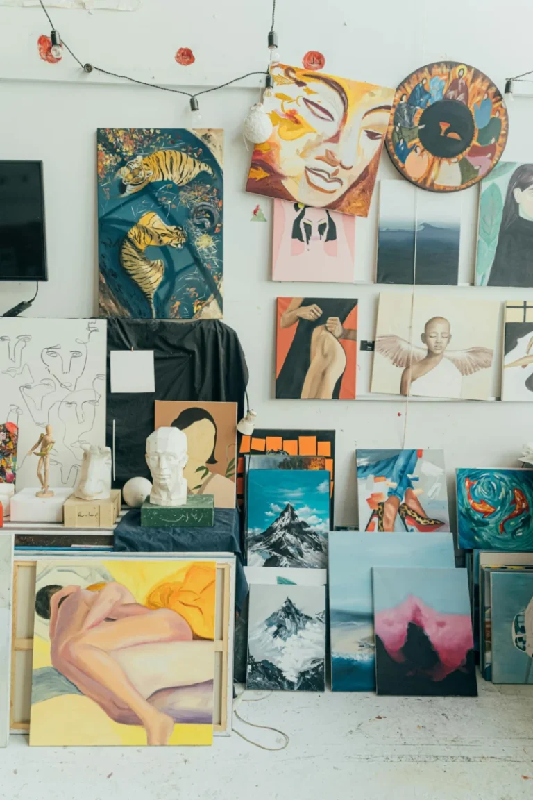 Simple and elegant clothing rack display in a minimalist studio with soft tones.