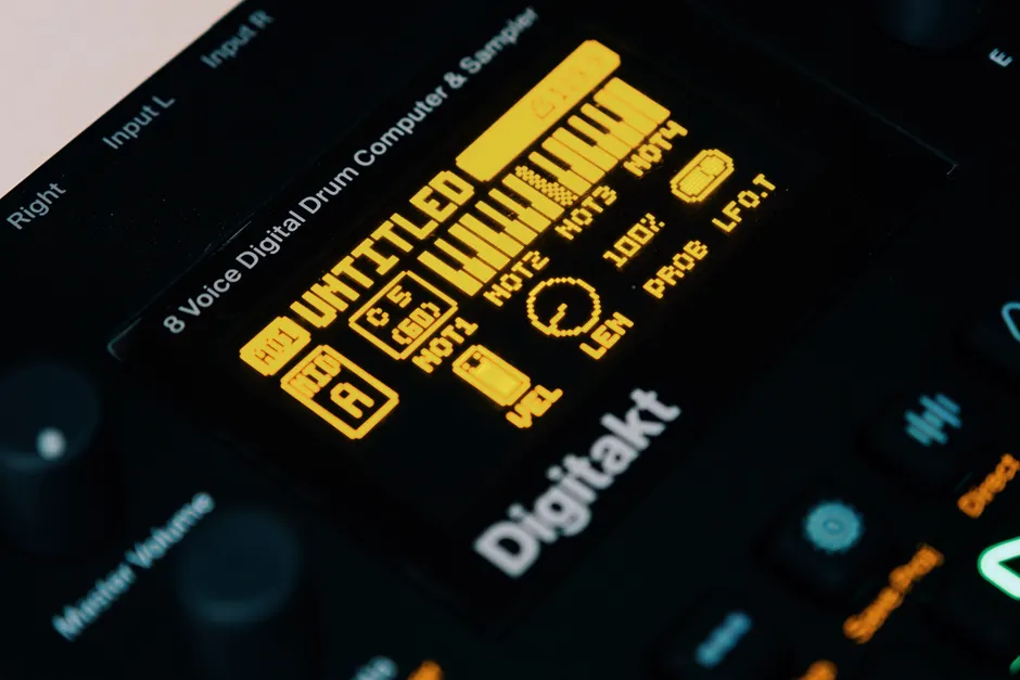 A detailed shot of the Digitakt drum machine OLED display showing musical parameters.