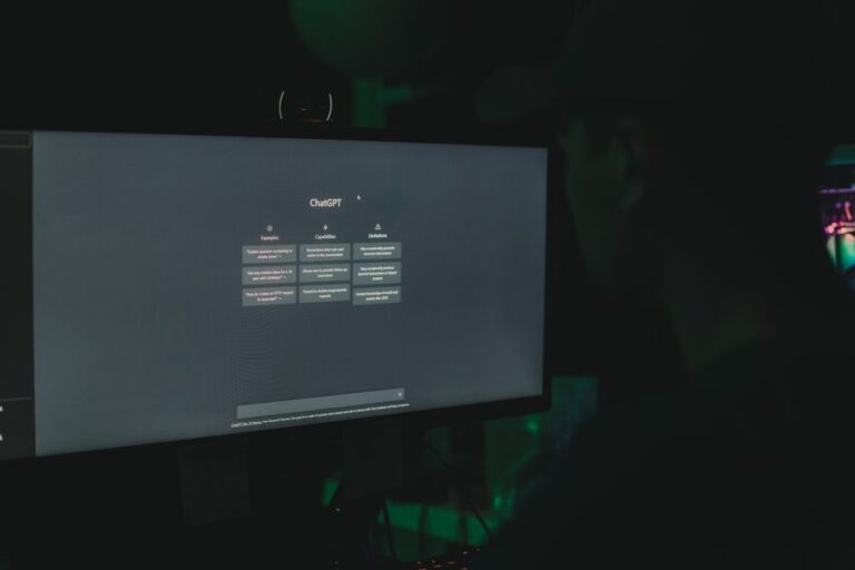 The Hunt disparaît d’Apple TV avant le 3 décembre 2025 A person interacting with ChatGPT interface on a computer screen in a dimly lit room.