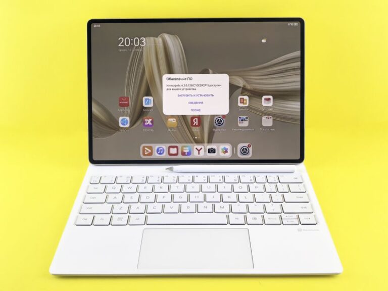 Apple visé en Pologne le 25 novembre 2025 : App Tracking Transparency, le pop-up qui fait grincer Sleek tablet with keyboard displaying a screen update prompt on a vibrant yellow background.